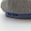 Thumbnail: Gray cap with Paul Smith signature, blue trim. Userjyn, a stylish cap.