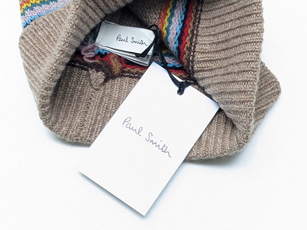 縮圖：Paul Smith brand tags on a beige ribbed knit item.