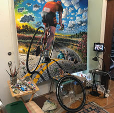 Detail "Chasing the Pack." With bike tire reference