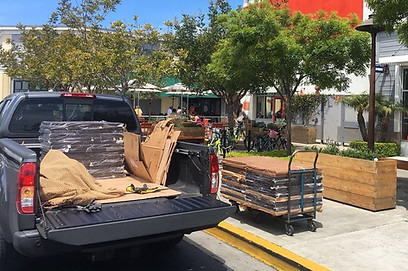 Table tops being delivered to a restaurant.