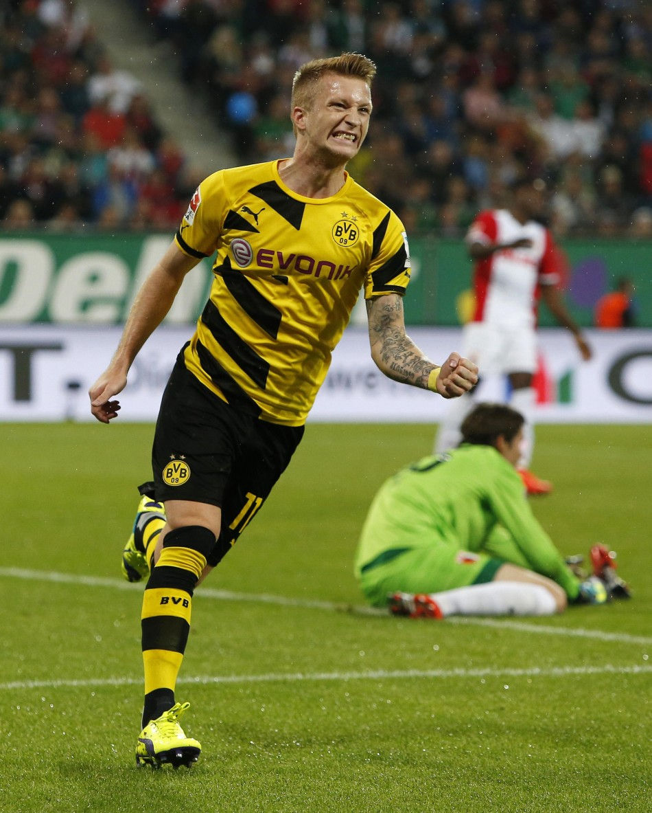 451278-borussia-dortmunds-marco-reus-celebrates-a-goal-against-augsburg-durin.JP