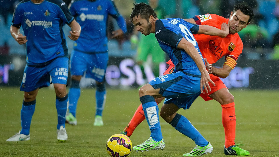 xavi-hernandez-pablo-sarabia-getafe-barcelona-liga-bbva-12132014_1jhyenuot93pu1h