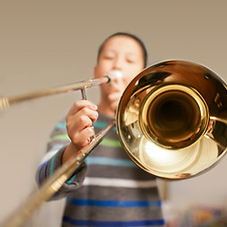 Boy Playing Trombone
