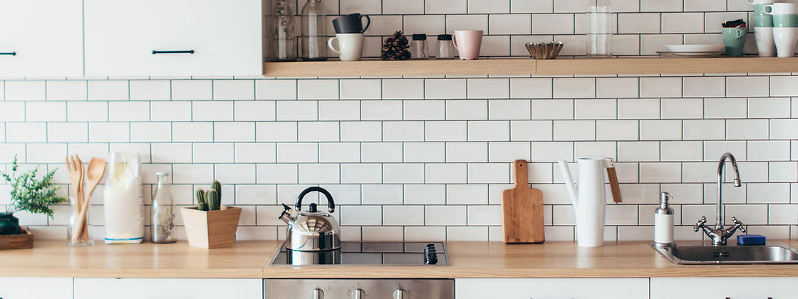 Kitchen decor with wood counter and white tiles