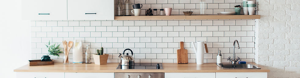 Kitchen decor with wood counter and white tiles