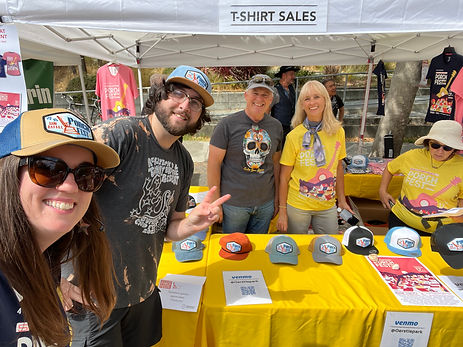 Volunteers at Merch w Tommy B.jpeg
