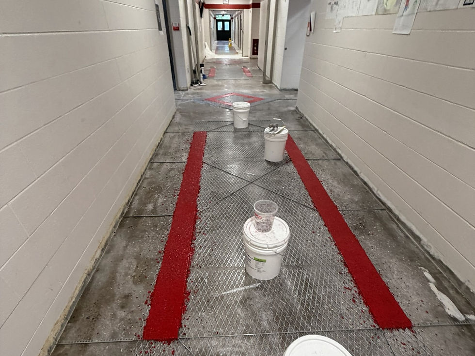 Commercial terrazzo strip layout and reinforcement during installation in a corridor