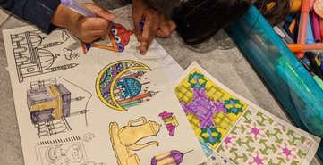 Ellie, colouring in Ramadan Window Trail 2022.jpeg