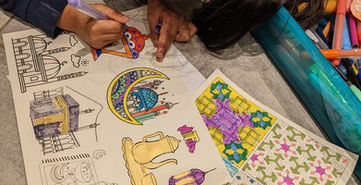 Ellie, colouring in Ramadan Window Trail 2022.jpeg