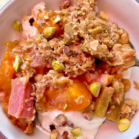 his Rhubarb Apricot Crisp truly highlights both fruits as the main attraction. The filling is delicate and subtly sweetened with coconut sugar and genuine maple syrup. Spelt flour is used instead of all-purpose flour to boost the crisp's nutritional benefits and nuts add a nutty crunch. It's incredibly easy to prepare and ideal for a summer gathering. Enjoy it with vanilla ice cream, whip cream or plain Greek yogurt! 