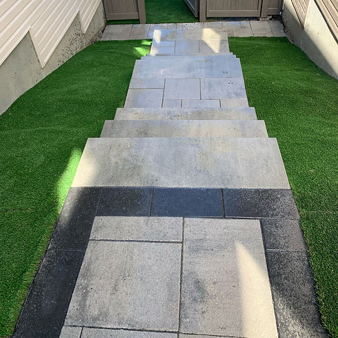 Interlock walkway connecting driveway to front step, installed by LevelScape