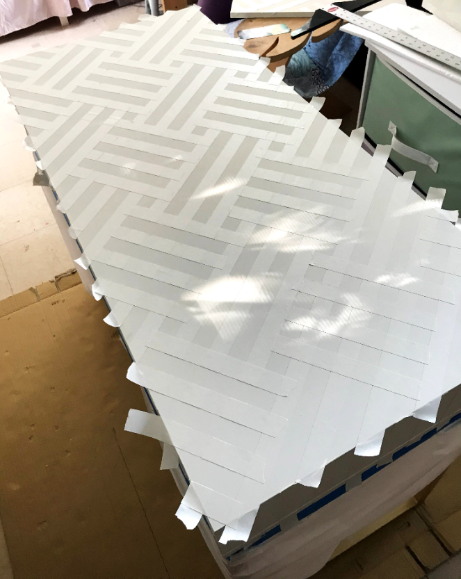 artist's tape for stencil pattern on desk