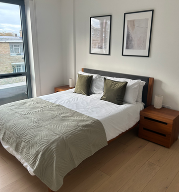 Modern double bed in Cocoon Apartments