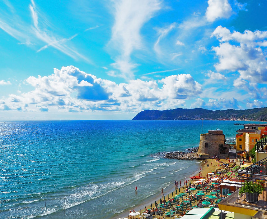 The historic Saracen tower on the beach in the Mediterranean city of Alassio on a sunny da