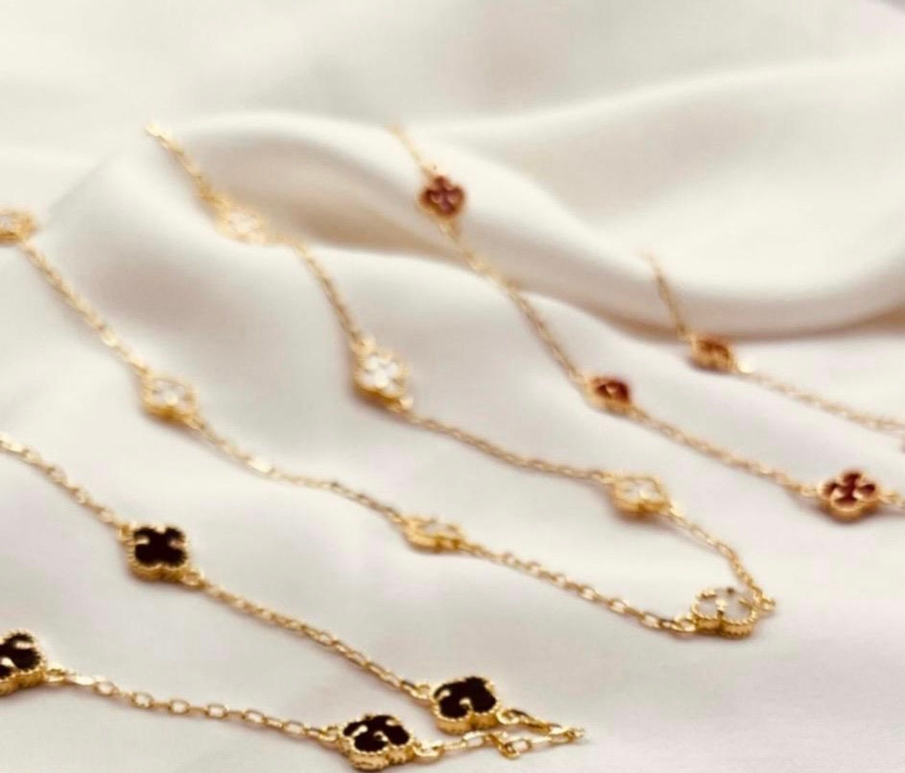 Red, white and black delicate clover necklace