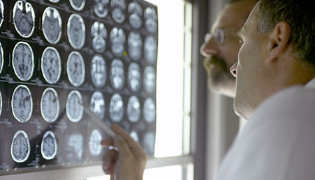 Doctor Analyzing X-Rays