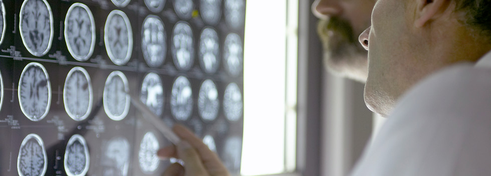 Doctor Analyzing X-Rays
