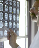 Doctor Analyzing X-Rays
