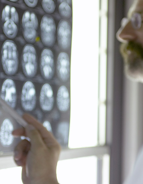 Doctor Analyzing X-Rays