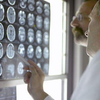 Doctor Analyzing X-Rays