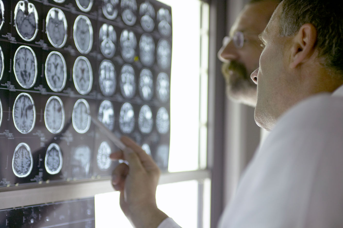 Doctor Analyzing X-Rays