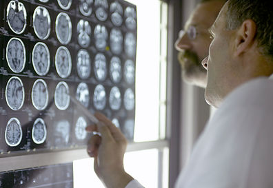 Doctor Analyzing X-Rays