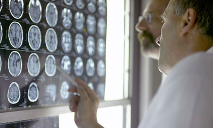 Doctor Analyzing X-Rays