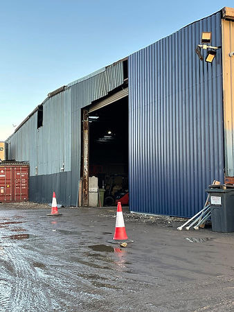 An industrial building with cladding