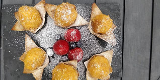 Close-up image of a dessert with strawberries