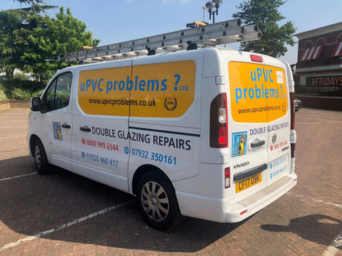 white van with business information for glazing repairs