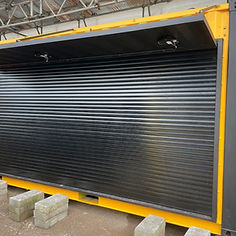 A closed black security shutter