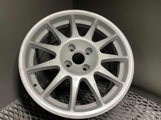 alloy wheel that has been chemically stripped