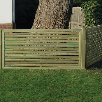 A fence made of slatted panels
