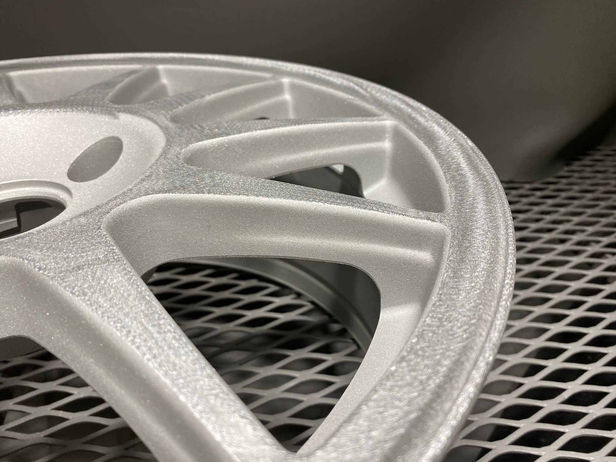 close up of a stripped part of an alloy wheel