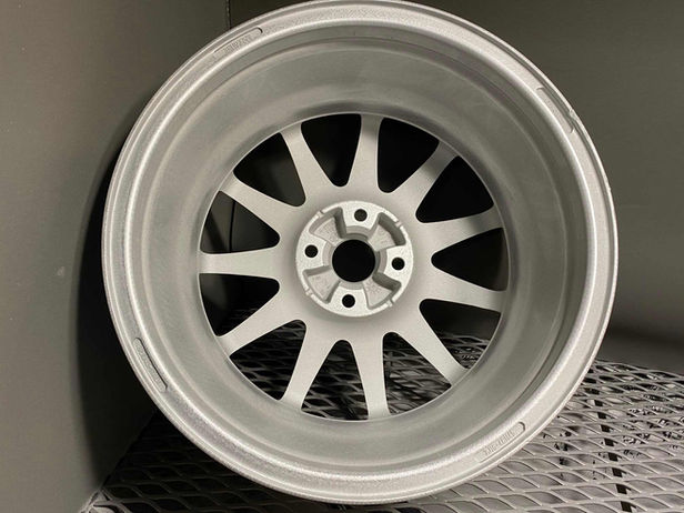 back of alloy wheel during chemical stripping
