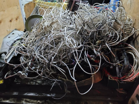 A picture revealing a cluster of discarded wires