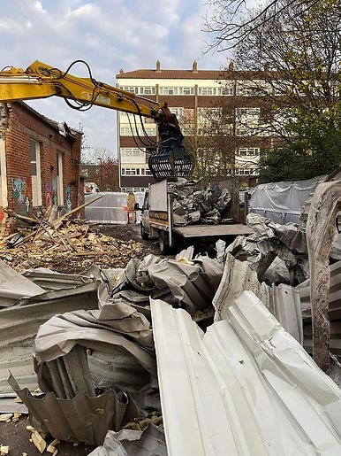 Picture showing a crane lifting scrap materials