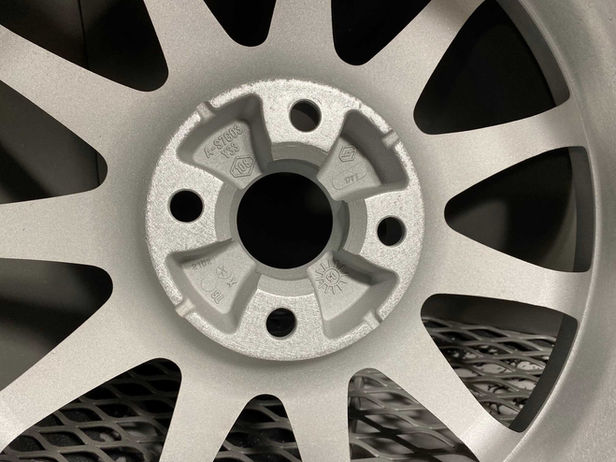 close up of ally wheel after stripping process