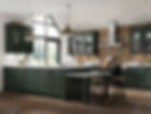 A modern kitchen featuring green cabinets, a marble countertop, brick wall, and large windows, with wooden stools and stylish lighting