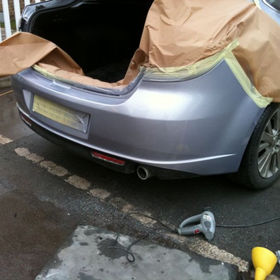 The trunk of the car is in repair
