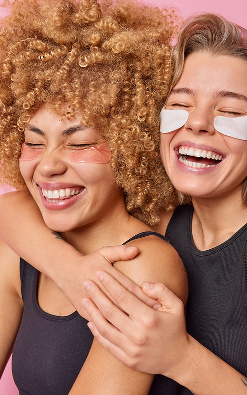 happy-joyful-female-models-embrace-and-laugh-gladfully-keep-eyes-closed-have-fun-undergo-b