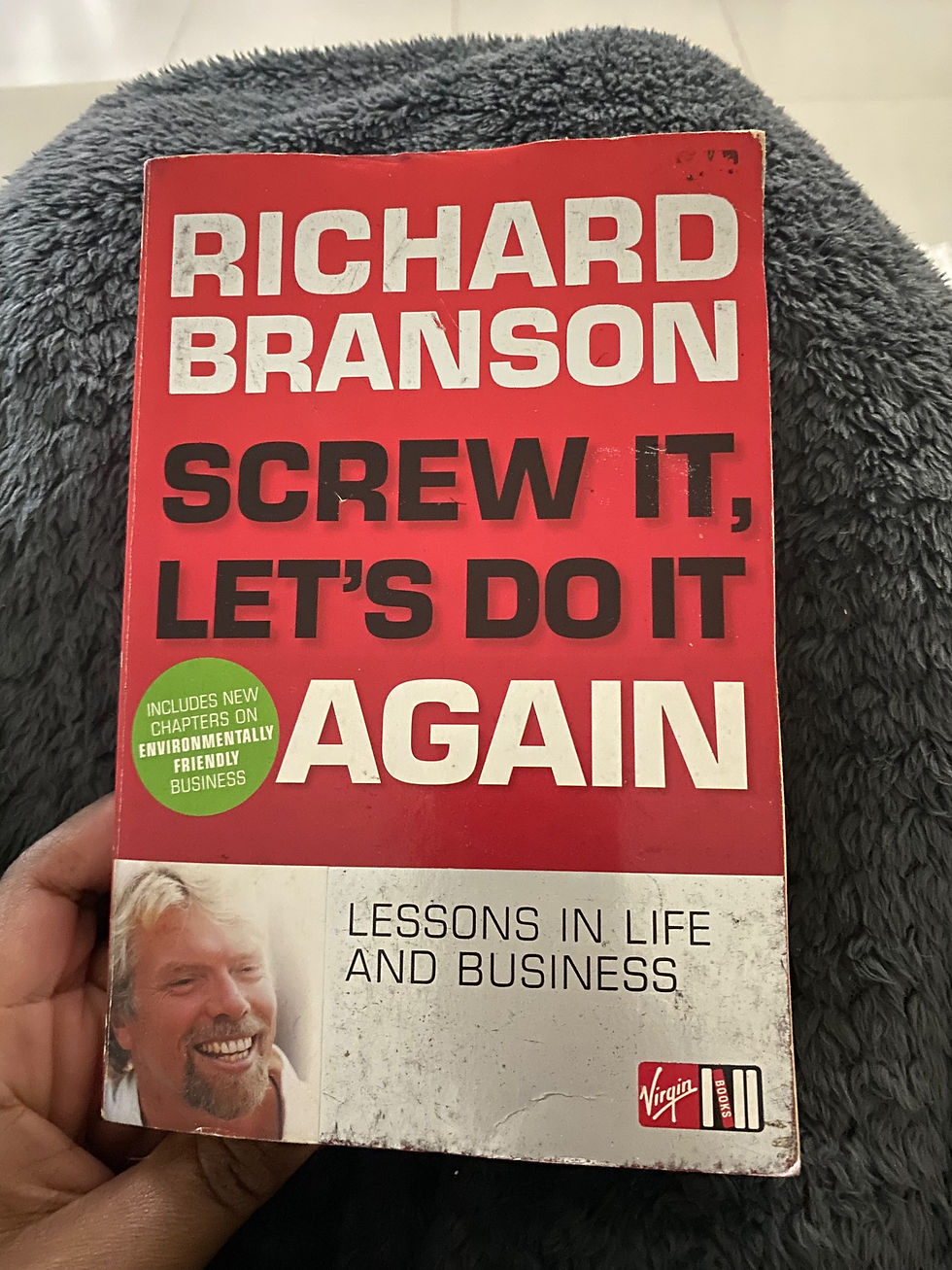 Reading book by Richard Brandson