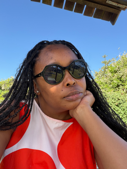 A woman wearing sunglasses