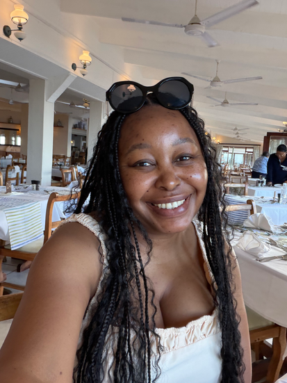 A woman smiling