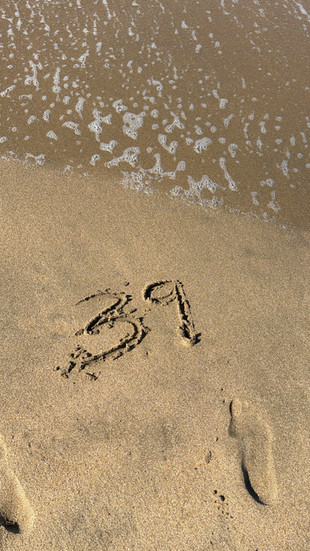 39 written in ocean sand