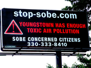 billboard with safety warning about pyrolysis