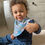 Thumbnail: Baby with Shark Patterned High Performance Kids Kozie Kool Drool Bib Wrap by Kozie Clothes
