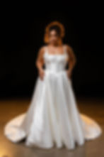 Hall wedding dress in mikado satin with boning detail and basque waist by Evie Young on plus size model