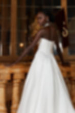 Twiggy wedding dress by Evie Young in Mikado satin with a thigh slip, basque waist and cateye strapless neckline