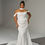 Thumbnail: plus size model wears Loren wedding dress by Evie Young in french crepe
